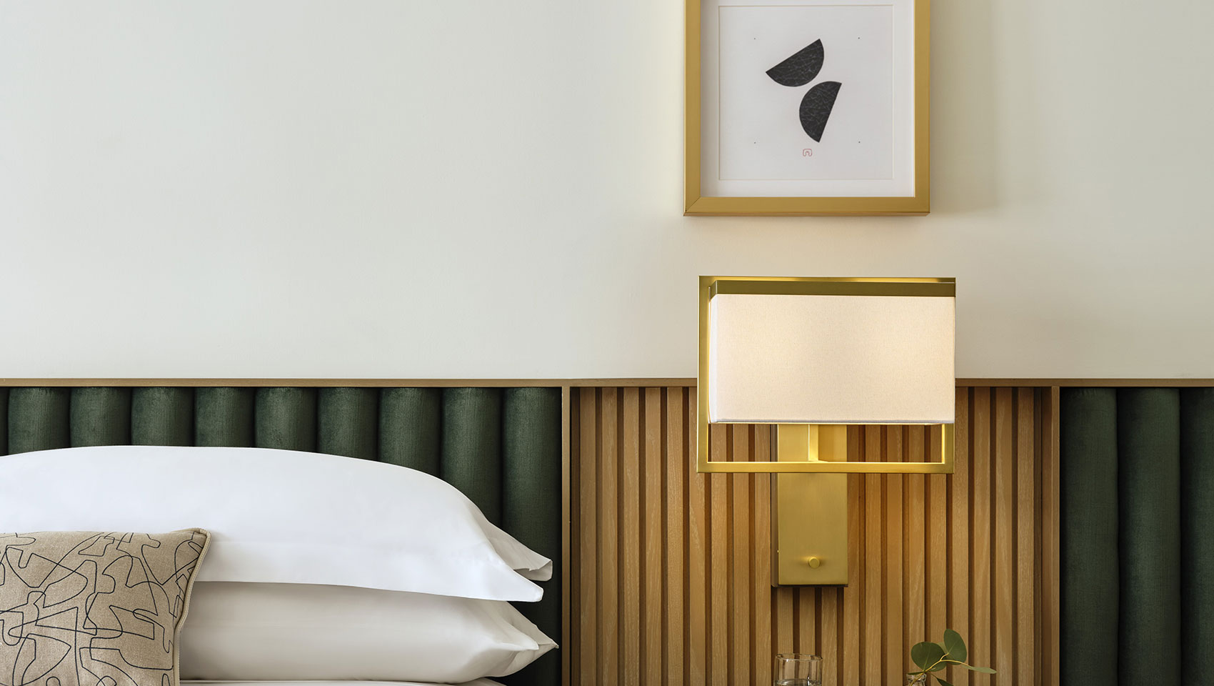 guestroom bed and side table at 70 Park Ave