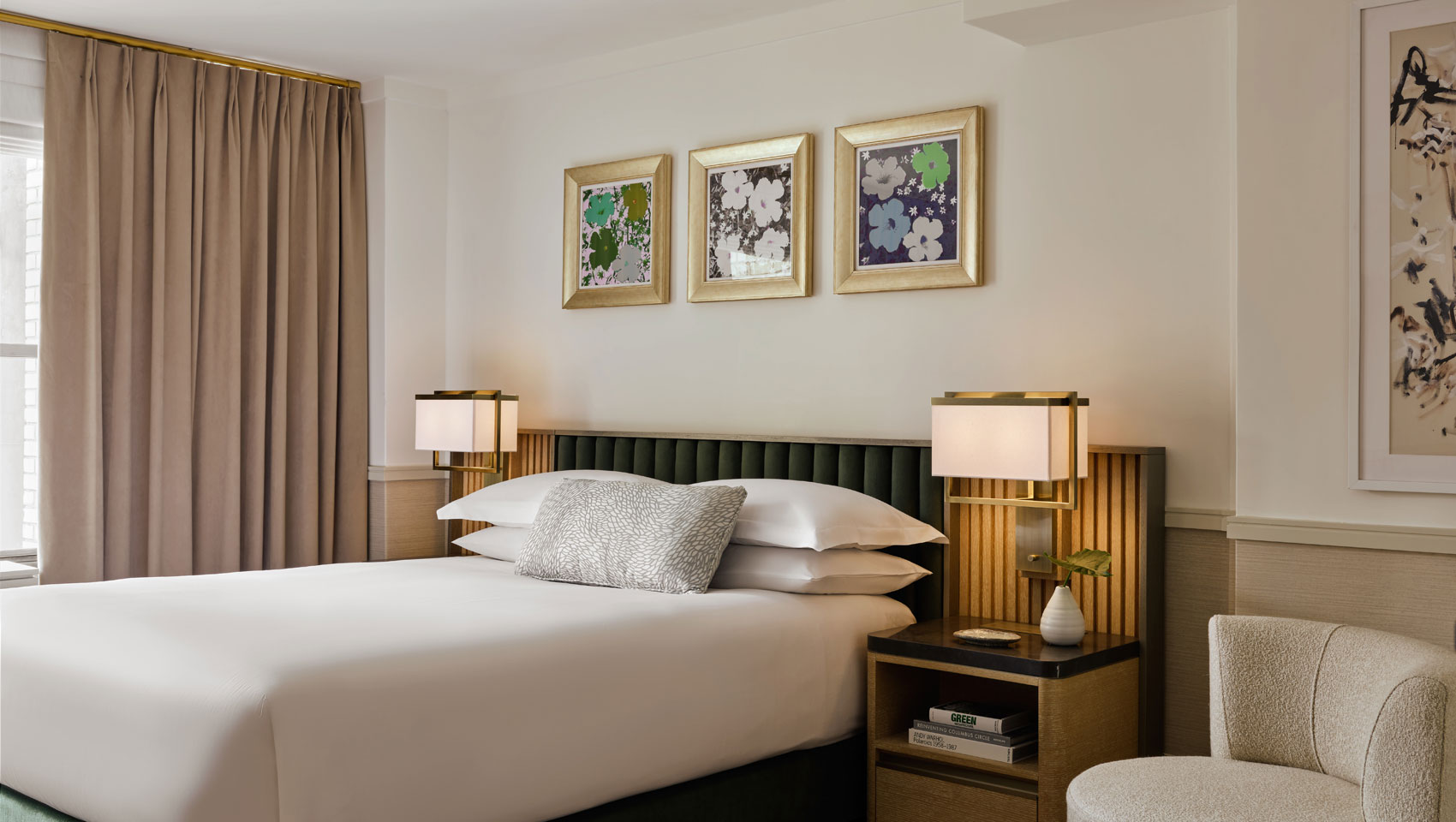 Guestroom with bed side tables and chair at Kimpton Ashbel Hotel