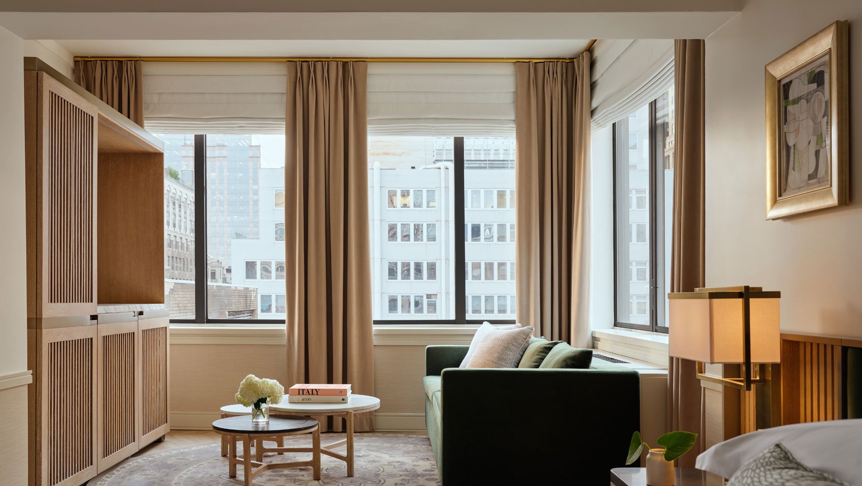 Studio Suite sitting area with sofa and views at Kimpton Ashbel Hotel