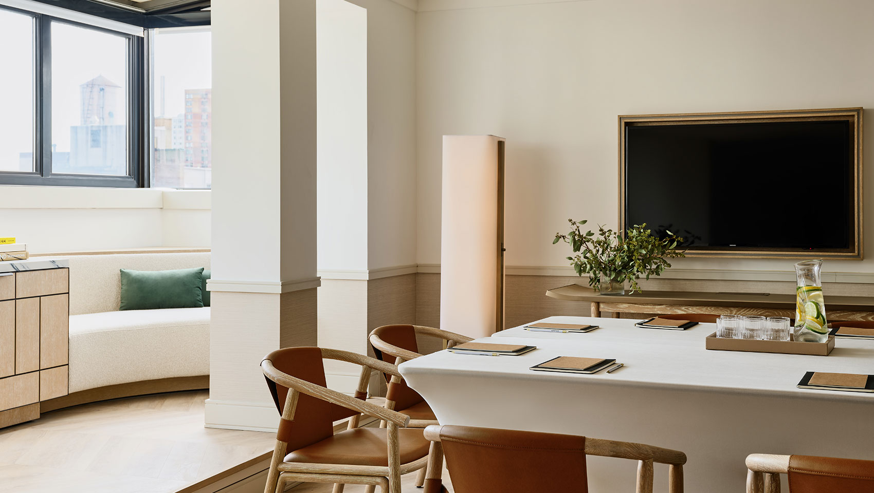 Meeting space featuring plentiful natural light in a luxury suite