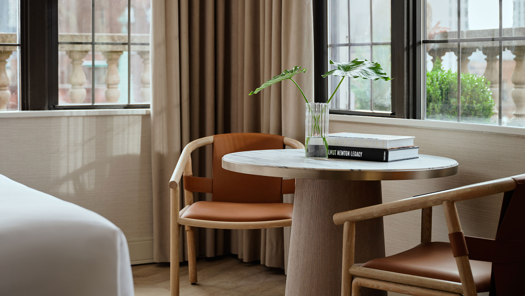 table and chairs in Kimpton Ashbel guestroom