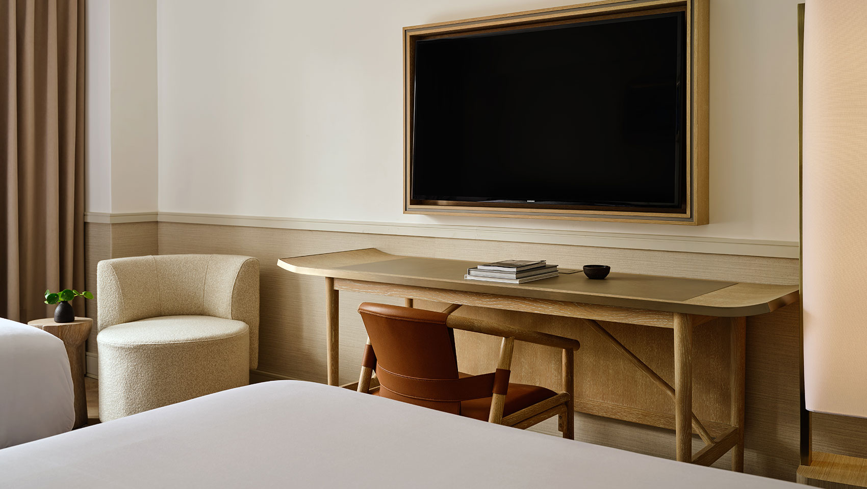 chair, desk and TV in Kimpton Ashbel guestroom